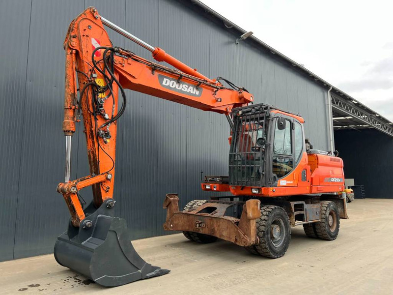 Doosan DX210W - Mobiele graafmachine: afbeelding 1 Doosan DX210W - Mobiele graafmachine: afbeelding 1