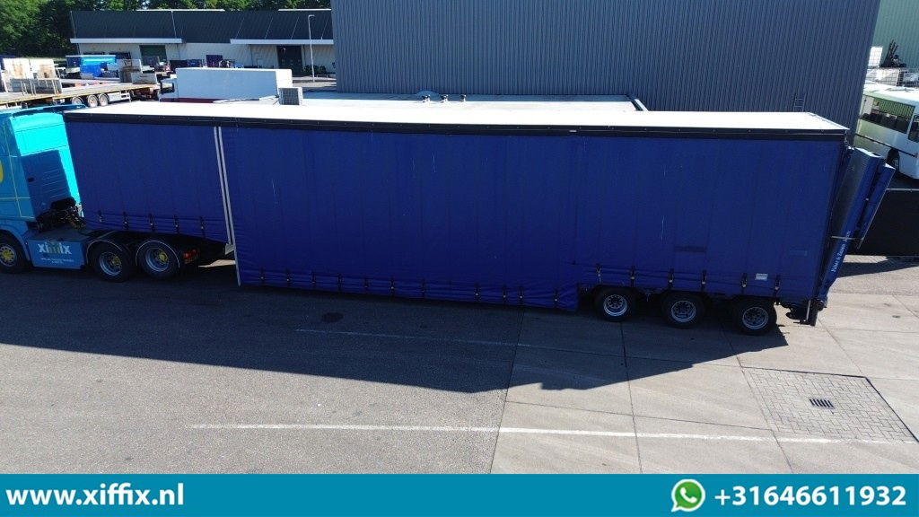 Goldhofer 3-ass. Dieplader met huifopbouw / Hydr. Hefbed en kleppen / 3x gestuur - Dieplader oplegger: afbeelding 2 Goldhofer 3-ass. Dieplader met huifopbouw / Hydr. Hefbed en kleppen / 3x gestuur - Dieplader oplegger: afbeelding 2