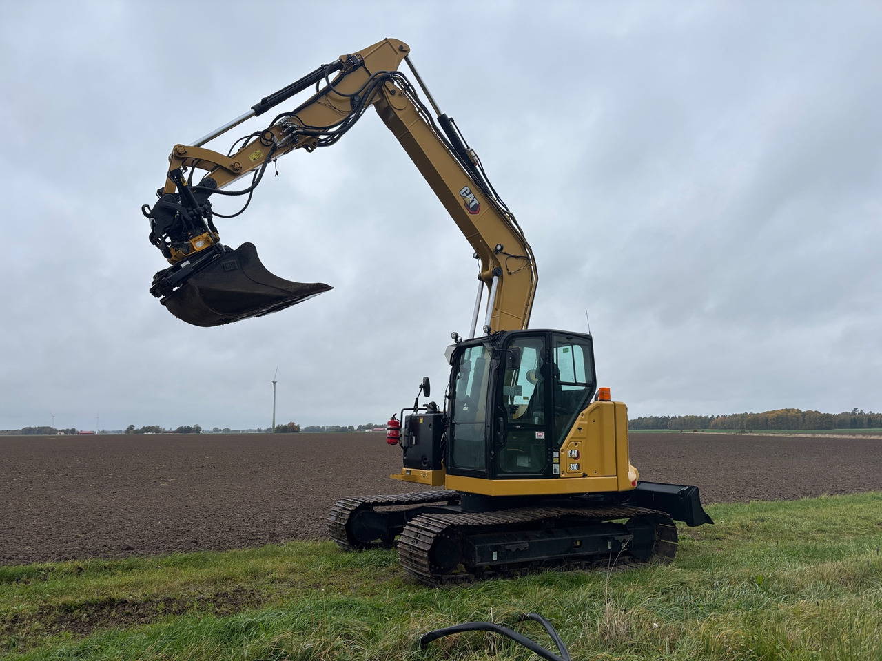CAT 310 07A - Graafmachine: afbeelding 1 CAT 310 07A - Graafmachine: afbeelding 1