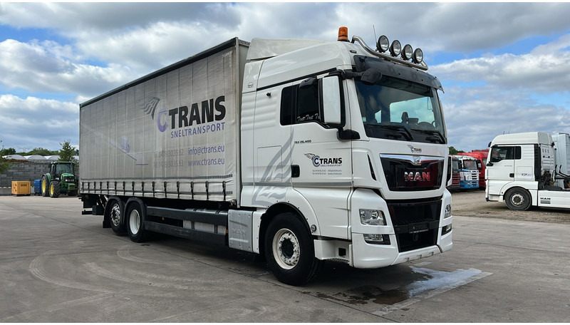 MAN TGX 26.400 (EURO 6 / 6X2 / LIFT / HAYON / BELGIAN TRUCK / GUTE ZUSTAND !! / 8.40 BOX LENGTH) - Schuifzeilen vrachtwagen: afbeelding 2 MAN TGX 26.400 (EURO 6 / 6X2 / LIFT / HAYON / BELGIAN TRUCK / GUTE ZUSTAND !! / 8.40 BOX LENGTH) - Schuifzeilen vrachtwagen: afbeelding 2
