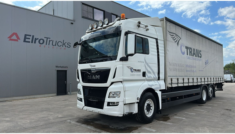 MAN TGX 26.400 (EURO 6 / 6X2 / LIFT / HAYON / BELGIAN TRUCK / GUTE ZUSTAND !! / 8.40 BOX LENGTH) - Schuifzeilen vrachtwagen: afbeelding 1 MAN TGX 26.400 (EURO 6 / 6X2 / LIFT / HAYON / BELGIAN TRUCK / GUTE ZUSTAND !! / 8.40 BOX LENGTH) - Schuifzeilen vrachtwagen: afbeelding 1