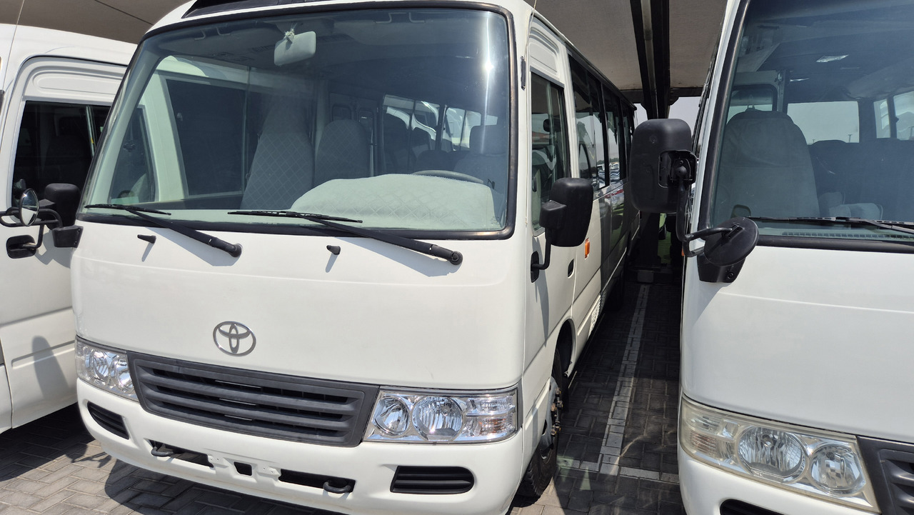 TOYOTA Coaster ... 30 places ... Climatisé - Minibus, Personenvervoer: afbeelding 1 TOYOTA Coaster ... 30 places ... Climatisé - Minibus, Personenvervoer: afbeelding 1