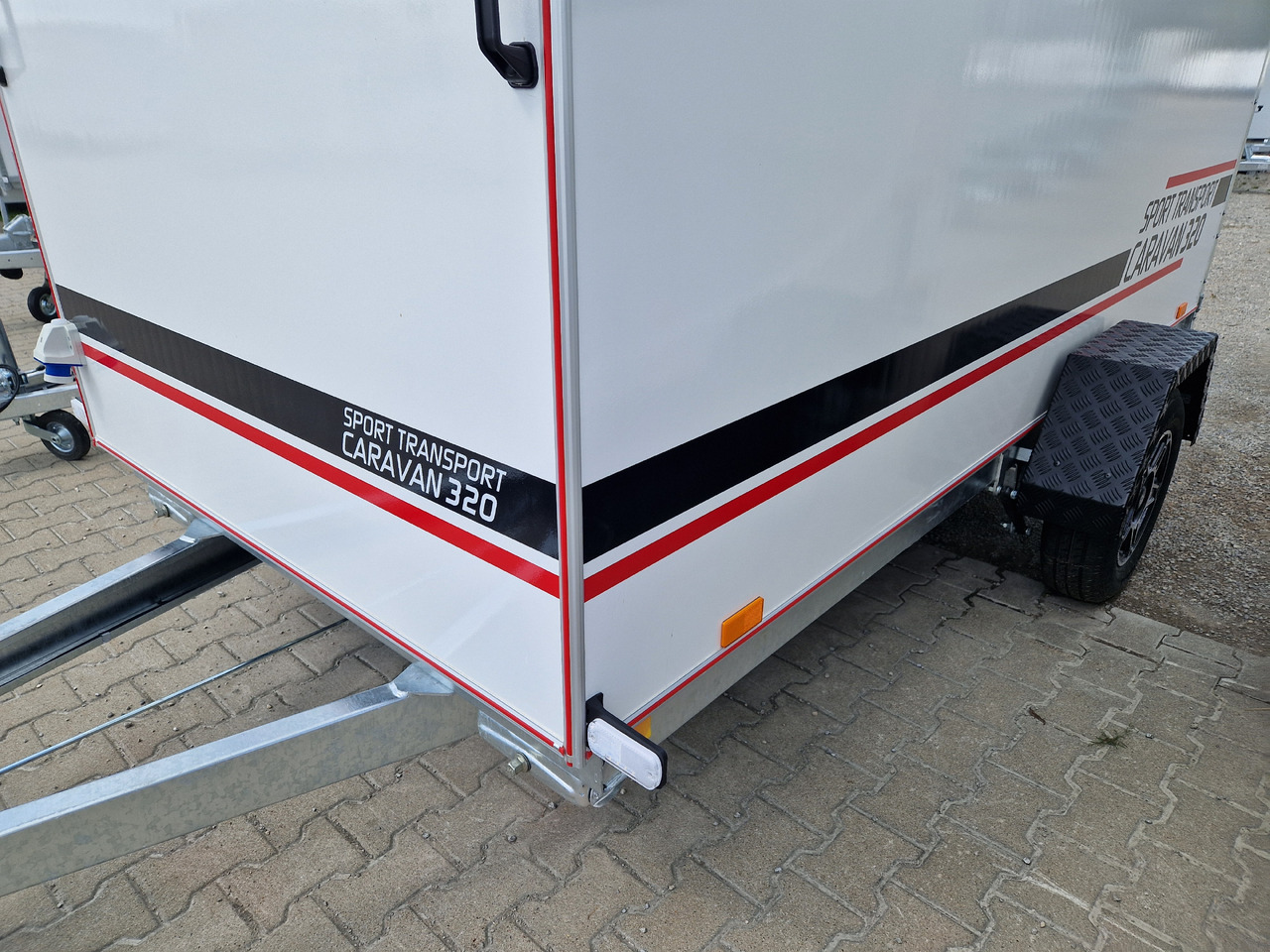 Koffer Camp TFS ST 320.01 320x150x180cm Premium Rampe Seitentür Fenster Bett 1300kg 100km/H - Caravan: afbeelding 3 Koffer Camp TFS ST 320.01 320x150x180cm Premium Rampe Seitentür Fenster Bett 1300kg 100km/H - Caravan: afbeelding 3