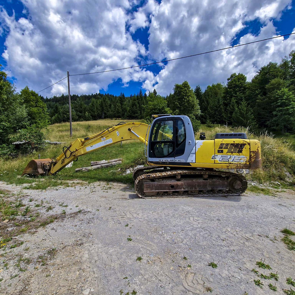 New Holland Kobelco E215 - Rupsgraafmachine: afbeelding 1 New Holland Kobelco E215 - Rupsgraafmachine: afbeelding 1