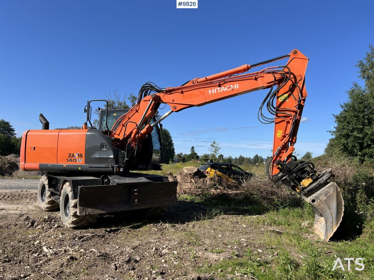 Hitachi ZX140 W-5B with rotor and planer bucket - Mobiele graafmachine: afbeelding 1 Hitachi ZX140 W-5B with rotor and planer bucket - Mobiele graafmachine: afbeelding 1