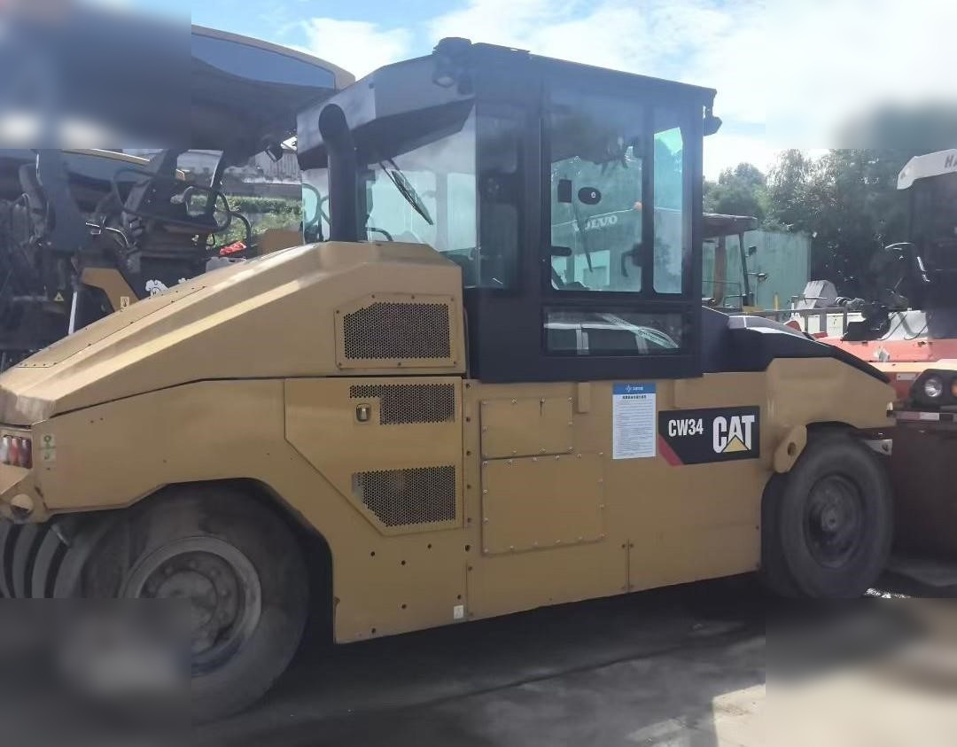 2019 CATERPILLAR CW34 - Bandenwals: afbeelding 1 2019 CATERPILLAR CW34 - Bandenwals: afbeelding 1