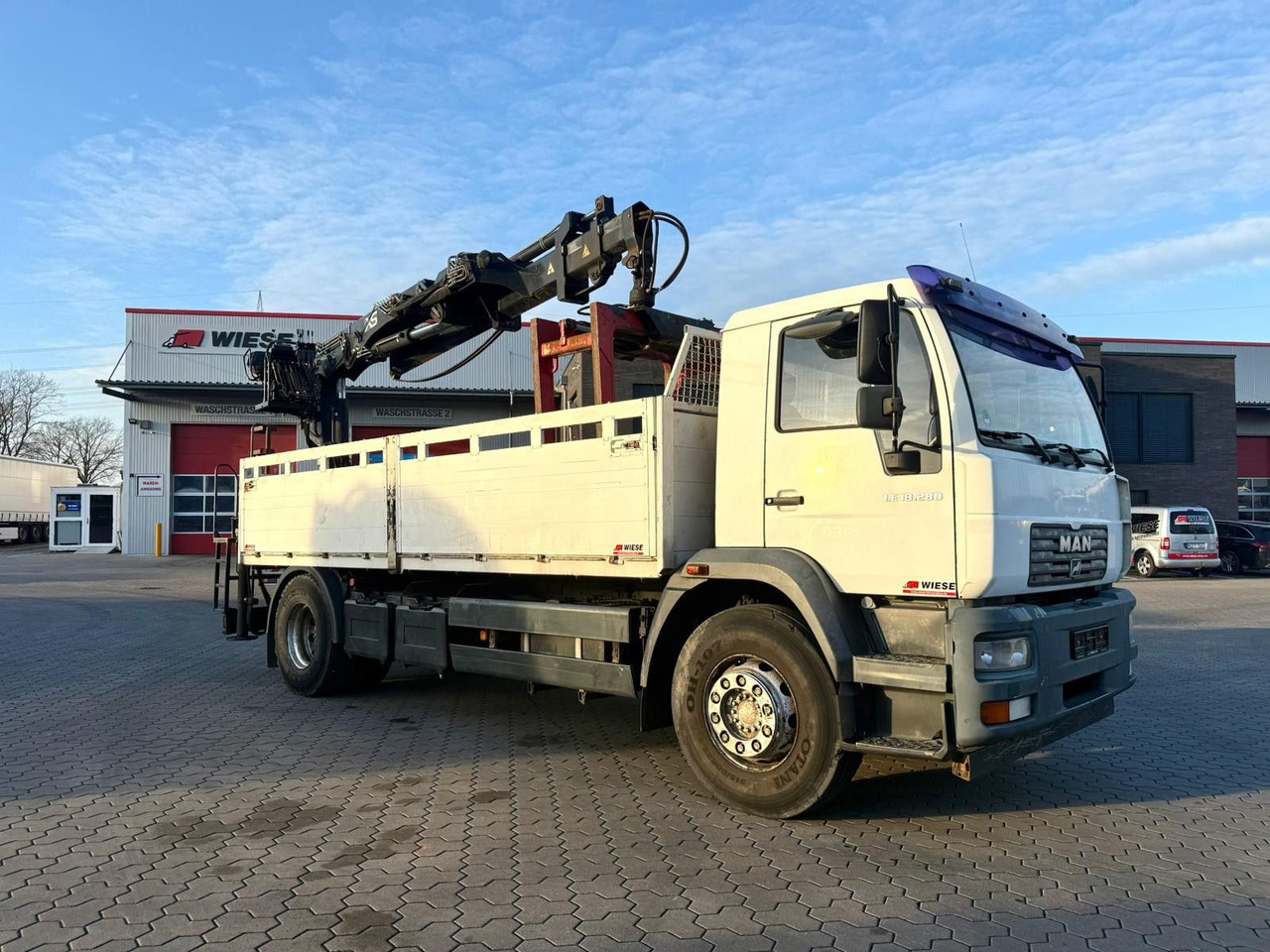 MAN LE 18.280 Pritsche mit HIAB 133 K PRO/HIPRO Kran - Vrachtwagen met open laadbak, Kraanwagen: afbeelding 1 MAN LE 18.280 Pritsche mit HIAB 133 K PRO/HIPRO Kran - Vrachtwagen met open laadbak, Kraanwagen: afbeelding 1