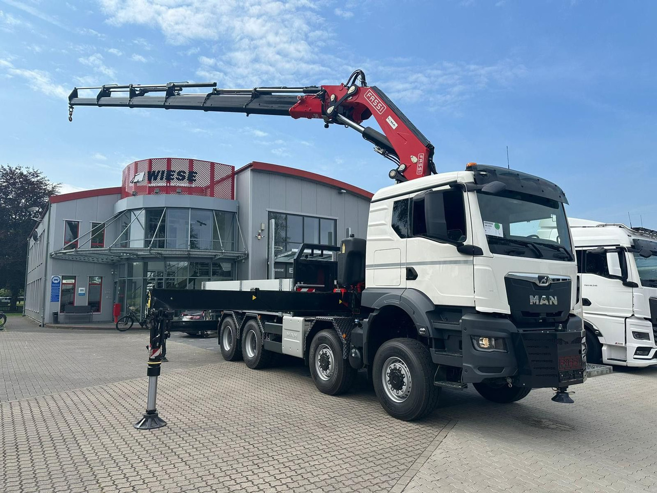 MAN TGS 41.520 8x8 mit Fassi Ladekran F710RA.2.26 - Kraanwagen: afbeelding 1 MAN TGS 41.520 8x8 mit Fassi Ladekran F710RA.2.26 - Kraanwagen: afbeelding 1