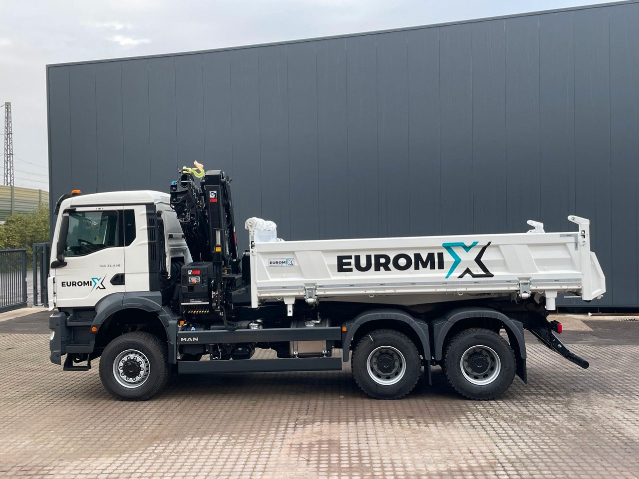 MAN TGS 33.440 6x6 /3-Seiten- Kipper / HIAB 228-6 - Kipper vrachtwagen, Kraanwagen: afbeelding 2 MAN TGS 33.440 6x6 /3-Seiten- Kipper / HIAB 228-6 - Kipper vrachtwagen, Kraanwagen: afbeelding 2