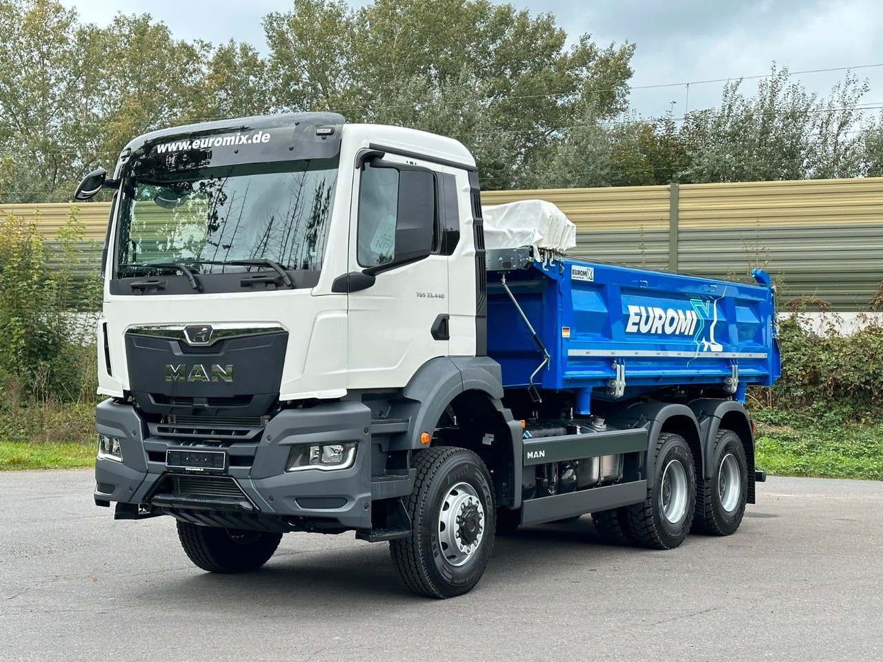 MAN TGS 33.440 6x6 /Euro6 3-Seiten-Kipper EuromixMTP - Kipper vrachtwagen: afbeelding 1 MAN TGS 33.440 6x6 /Euro6 3-Seiten-Kipper EuromixMTP - Kipper vrachtwagen: afbeelding 1