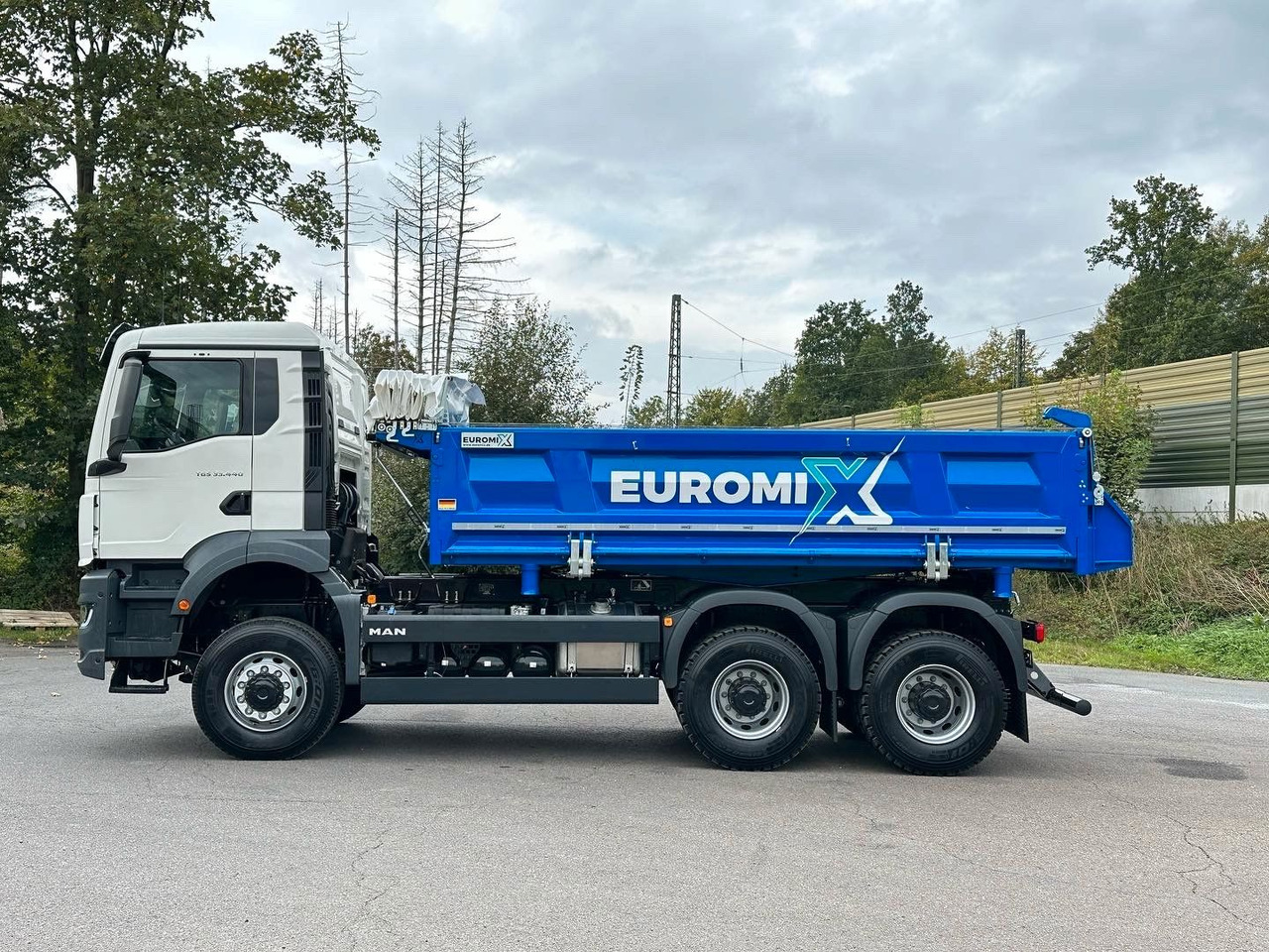 MAN TGS 33.440 6x6 /Euro6 3-Seiten-Kipper EuromixMTP - Kipper vrachtwagen: afbeelding 3 MAN TGS 33.440 6x6 /Euro6 3-Seiten-Kipper EuromixMTP - Kipper vrachtwagen: afbeelding 3