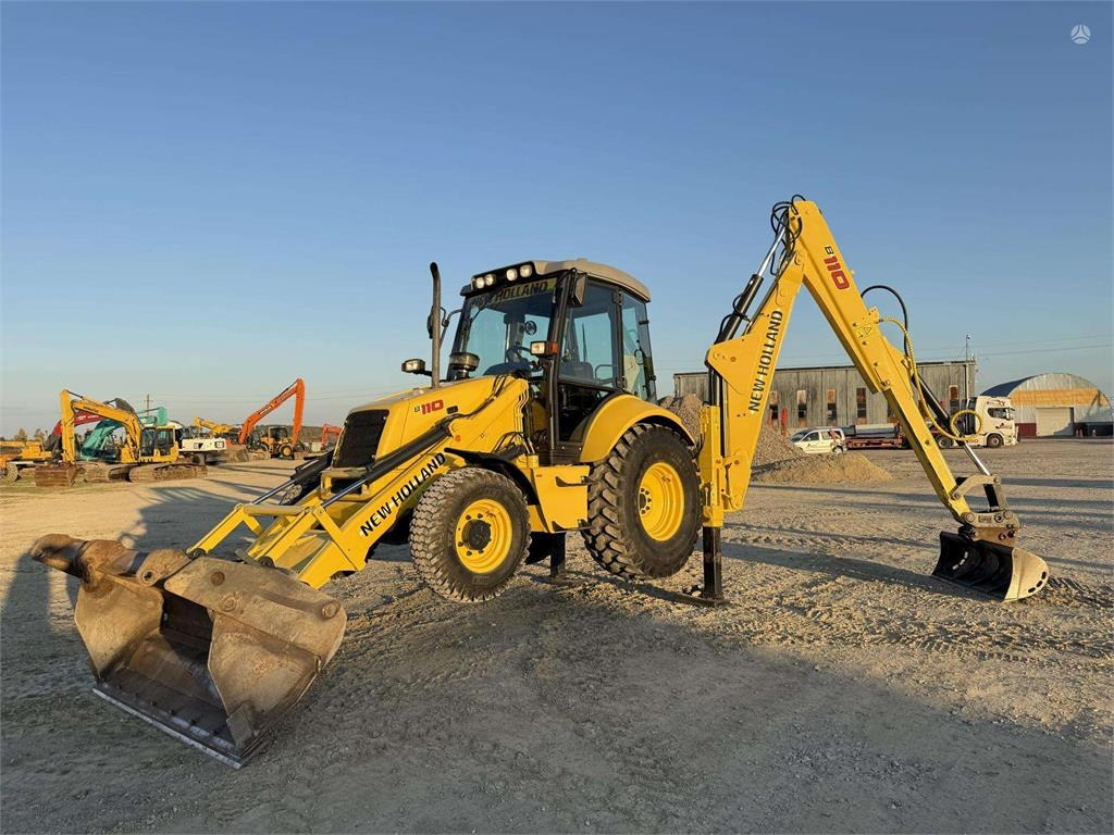 New Holland B 110-4PT , 2 quick couplers - Graaflaadmachine: afbeelding 1 New Holland B 110-4PT , 2 quick couplers - Graaflaadmachine: afbeelding 1