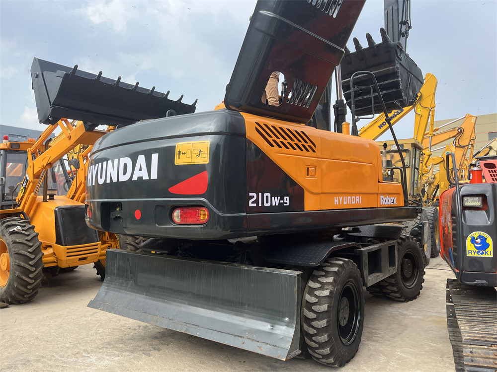 HYUNDAI 210W-9S - Mobiele graafmachine: afbeelding 1 HYUNDAI 210W-9S - Mobiele graafmachine: afbeelding 1