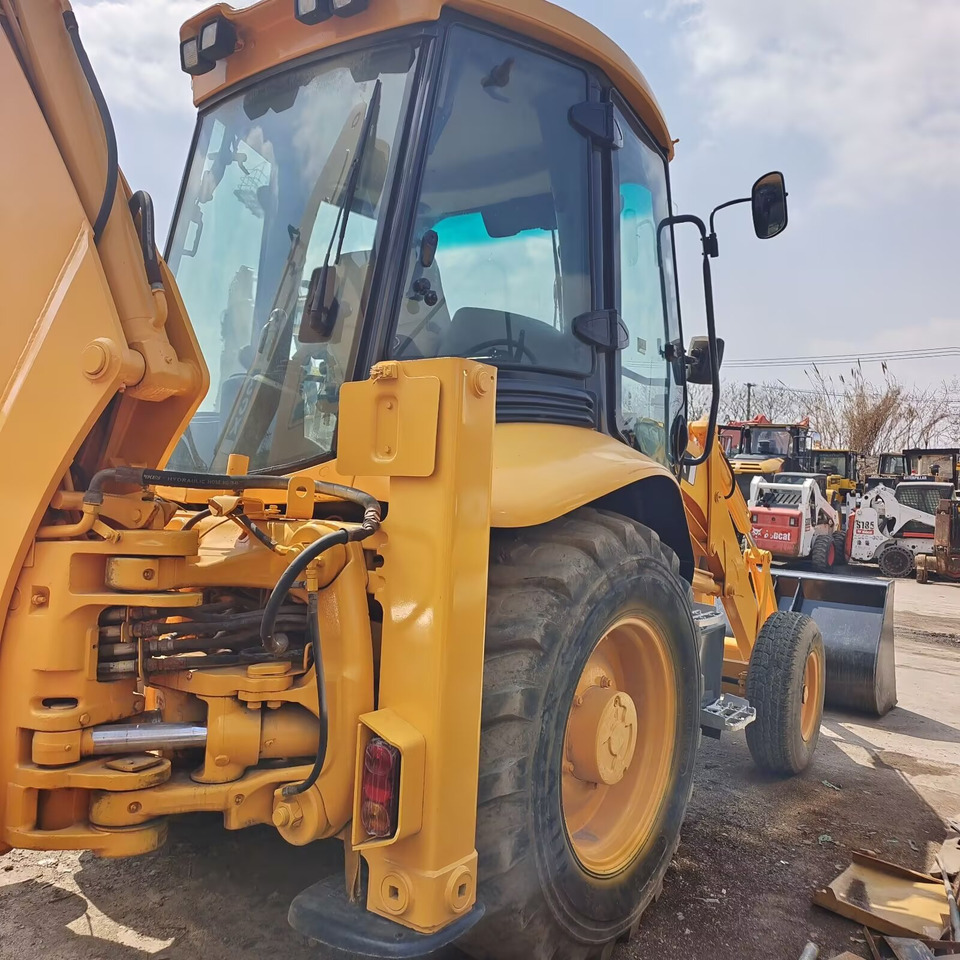 JCB 3CX MADE IN UK - Graaflaadmachine: afbeelding 1 JCB 3CX MADE IN UK - Graaflaadmachine: afbeelding 1