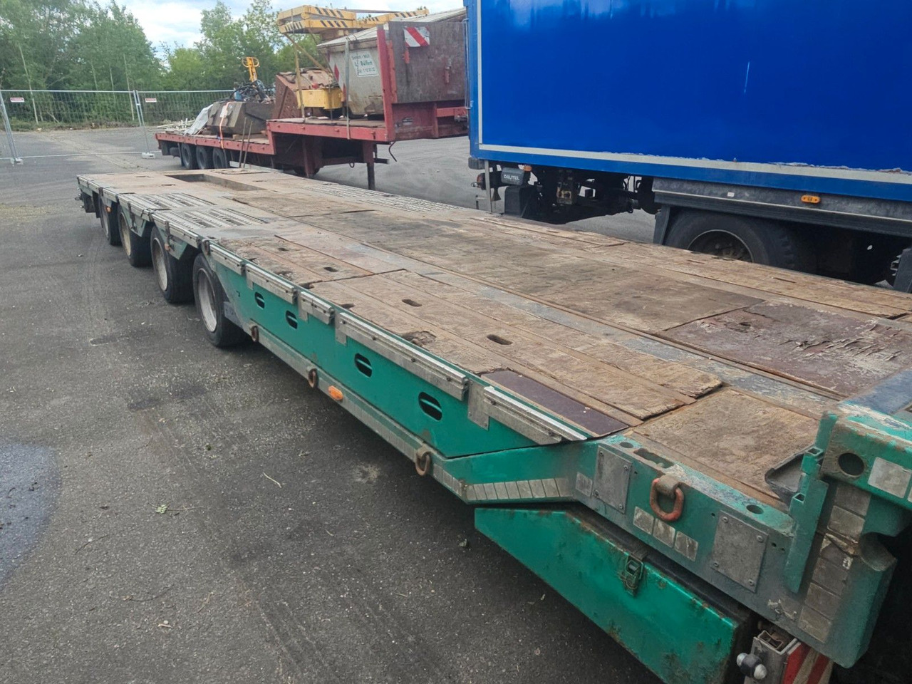 Meusburger MPG-4 Tieflader mit Radmulden 39.5t - Dieplader oplegger: afbeelding 4 Meusburger MPG-4 Tieflader mit Radmulden 39.5t - Dieplader oplegger: afbeelding 4