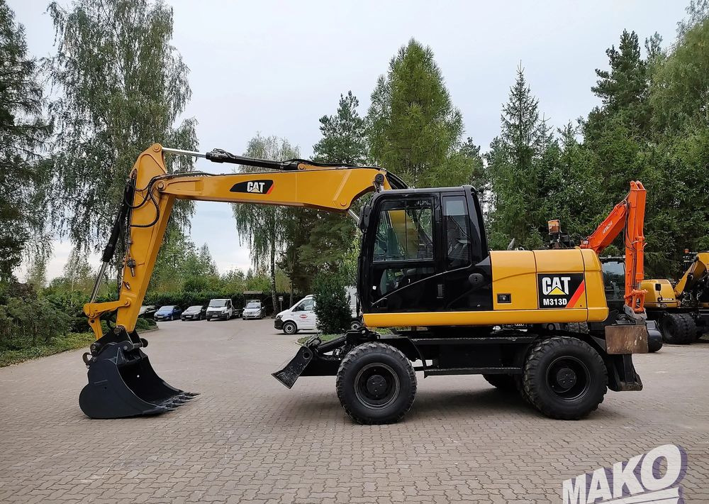 Caterpillar M313D - Mobiele graafmachine: afbeelding 1 Caterpillar M313D - Mobiele graafmachine: afbeelding 1