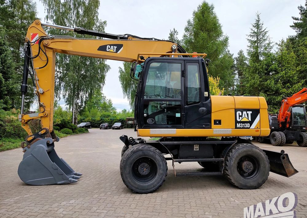 Caterpillar M313D - Mobiele graafmachine: afbeelding 1 Caterpillar M313D - Mobiele graafmachine: afbeelding 1