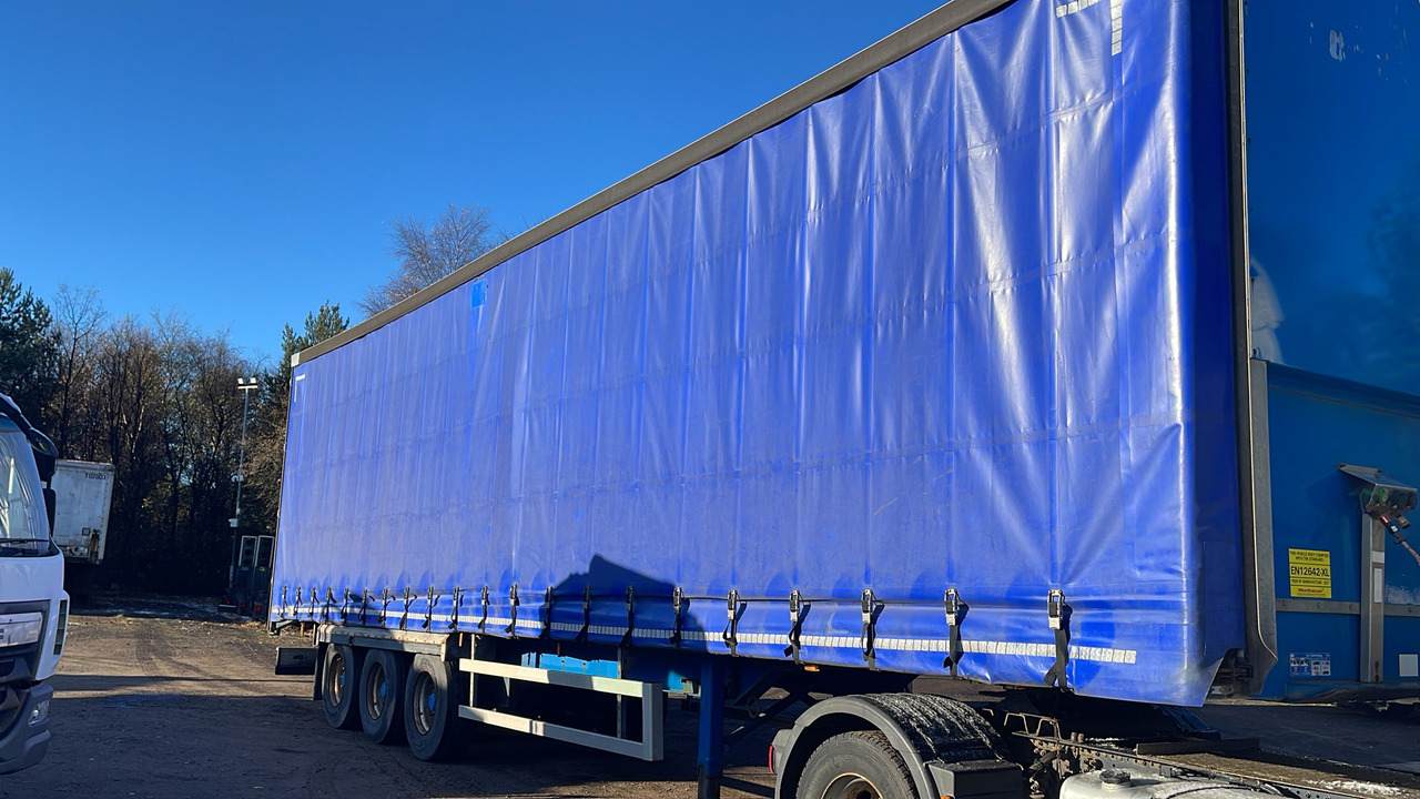 Montracon Curtainside TRI AXLE - Schuifzeiloplegger: afbeelding 1 Montracon Curtainside TRI AXLE - Schuifzeiloplegger: afbeelding 1