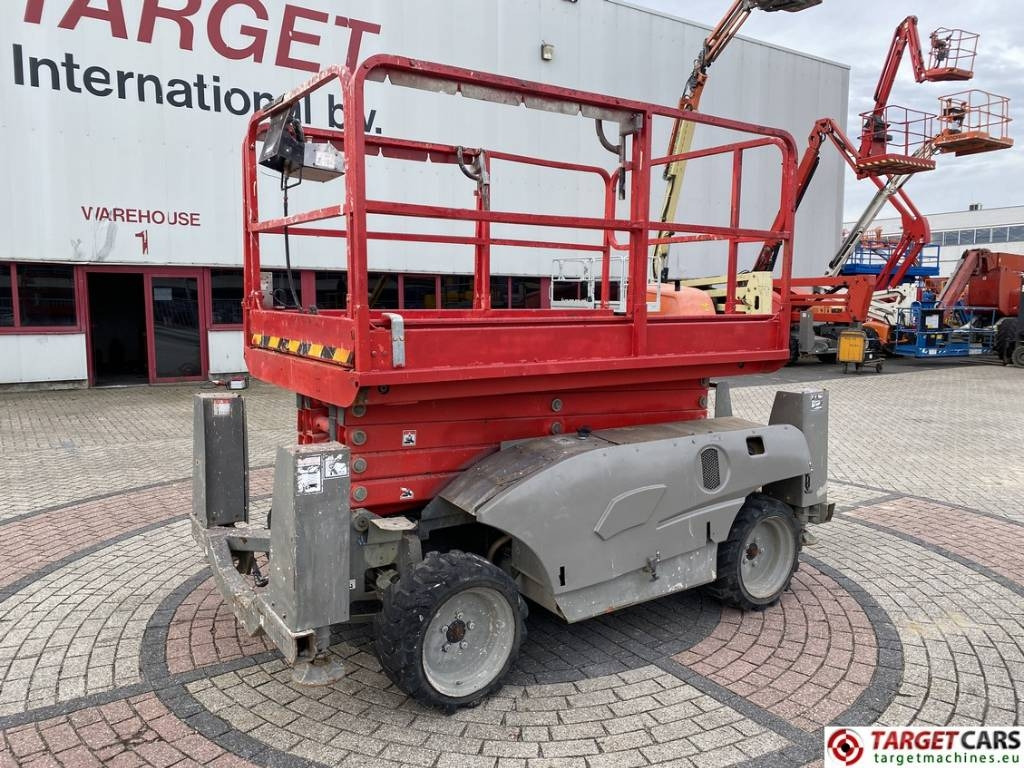 Haulotte Compact 12DX Diesel 4x4 Scissor Work Lift 1206cm - Schaarlift: afbeelding 1 Haulotte Compact 12DX Diesel 4x4 Scissor Work Lift 1206cm - Schaarlift: afbeelding 1
