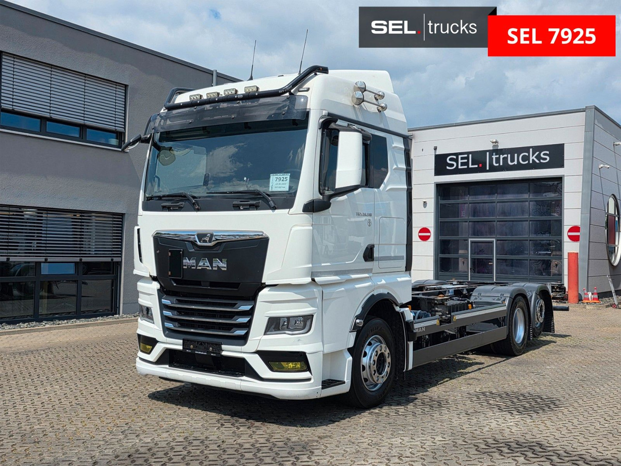 MAN TGX 26.510 6x2-2 LL CH / ZF Intarder / Liftachse - Containertransporter/ Wissellaadbak vrachtwagen: afbeelding 1 MAN TGX 26.510 6x2-2 LL CH / ZF Intarder / Liftachse - Containertransporter/ Wissellaadbak vrachtwagen: afbeelding 1