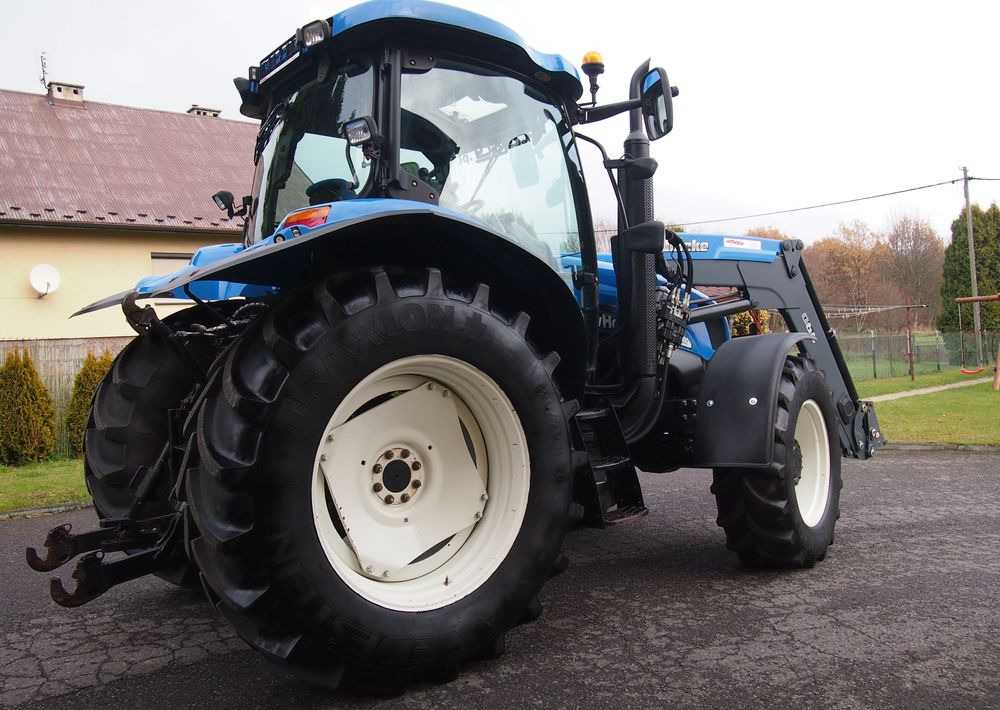 Ciągnik New Holland NH TS125A 6 cylindrów 2004 Ciągnik rolniczy New Holland TS125A - Tractor: afbeelding 4 Ciągnik New Holland NH TS125A 6 cylindrów 2004 Ciągnik rolniczy New Holland TS125A - Tractor: afbeelding 4