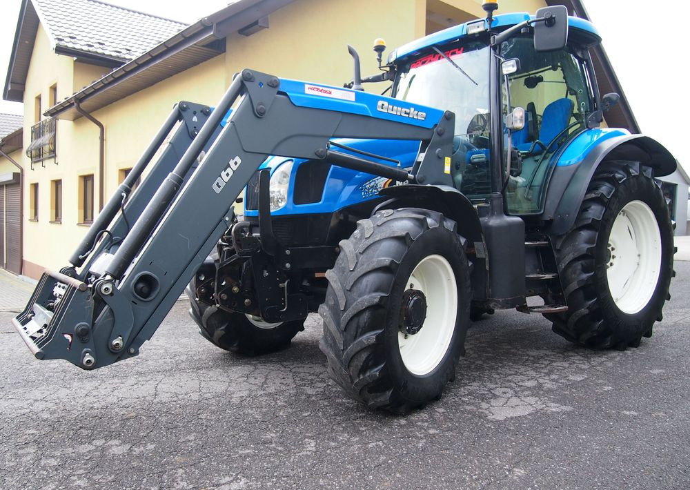 Ciągnik New Holland NH TS125A 6 cylindrów 2004 Ciągnik rolniczy New Holland TS125A - Tractor: afbeelding 1 Ciągnik New Holland NH TS125A 6 cylindrów 2004 Ciągnik rolniczy New Holland TS125A - Tractor: afbeelding 1