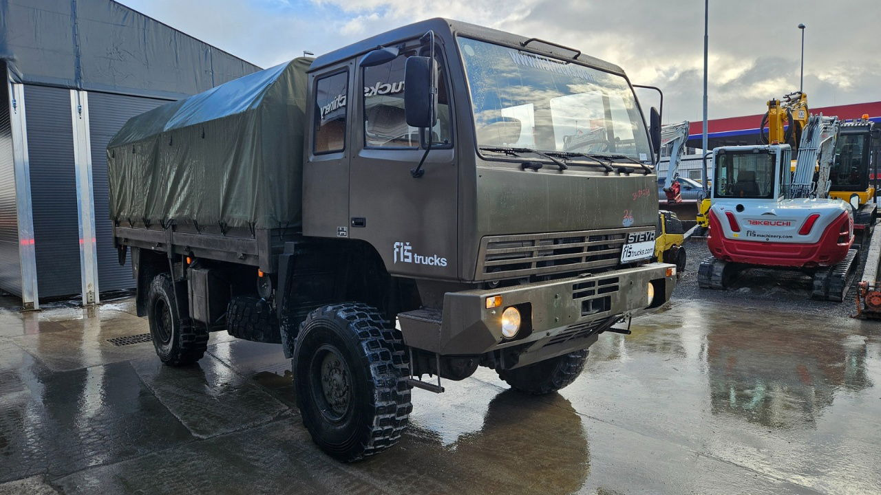 Steyr 12M18 4X4 stake body - truck - Schuifzeilen vrachtwagen: afbeelding 2 Steyr 12M18 4X4 stake body - truck - Schuifzeilen vrachtwagen: afbeelding 2