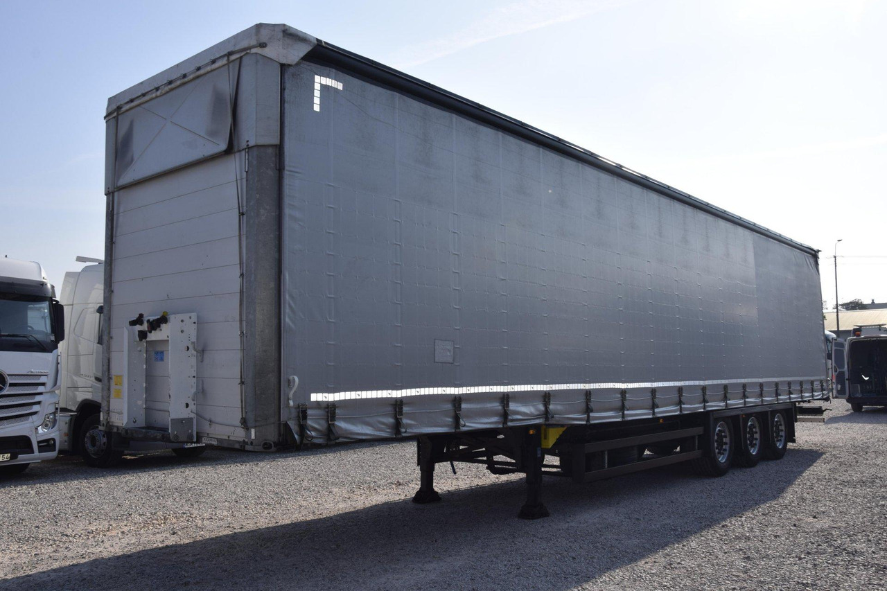 Schmitz Cargobull SCS24/L Varios - Schuifzeiloplegger: afbeelding 1 Schmitz Cargobull SCS24/L Varios - Schuifzeiloplegger: afbeelding 1