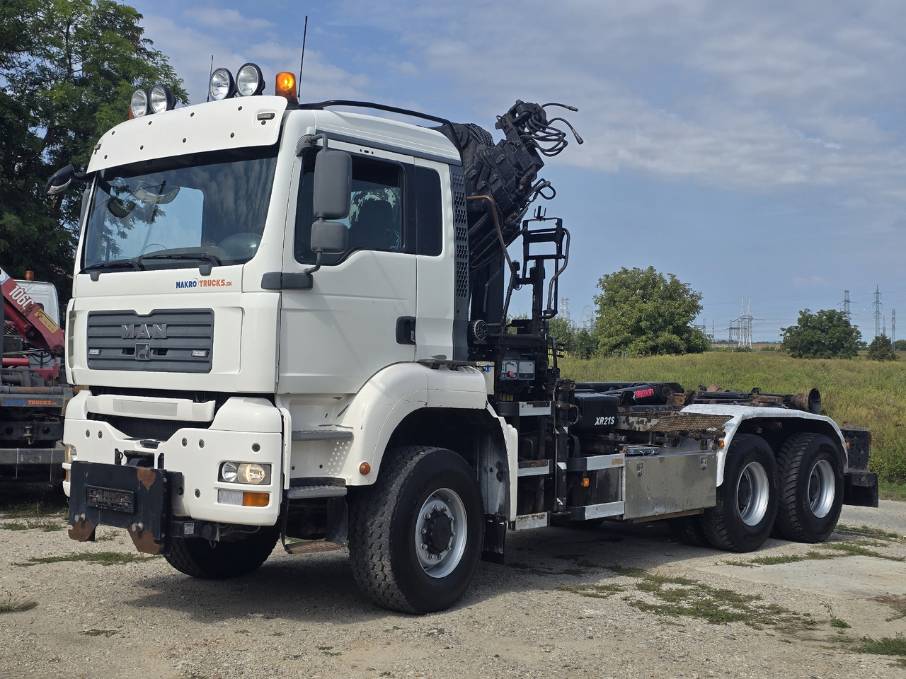 MAN TGA 26.440 6X6 / HOOK SYSTEM / HIAB 166D REMOTE SPECIAL PRICE ONLY THIS YEAR - Haakarmsysteem vrachtwagen, Kraanwagen: afbeelding 1 MAN TGA 26.440 6X6 / HOOK SYSTEM / HIAB 166D REMOTE SPECIAL PRICE ONLY THIS YEAR - Haakarmsysteem vrachtwagen, Kraanwagen: afbeelding 1