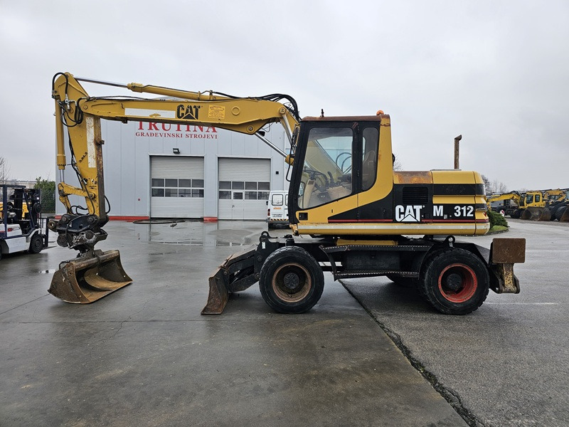 CATERPILLAR M312D - Mobiele graafmachine: afbeelding 1 CATERPILLAR M312D - Mobiele graafmachine: afbeelding 1