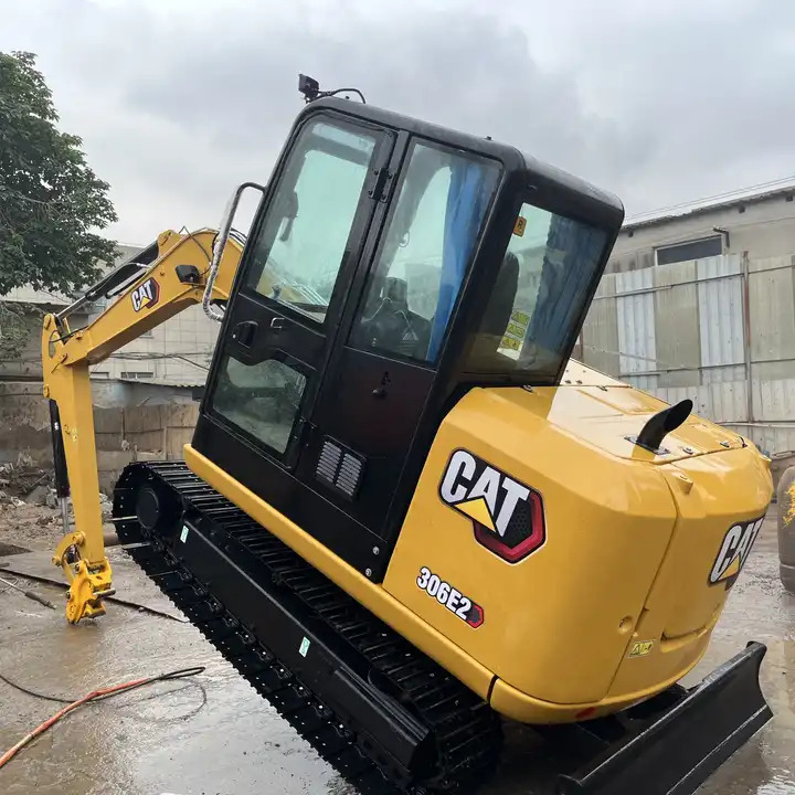 Japan excavator 6ton CAT 306E 306E2 306D 305.5 307 308 excavator 95% new retro CAT 305.5 5.5tons with mini excavator bucket - Rupsgraafmachine: afbeelding 2 Japan excavator 6ton CAT 306E 306E2 306D 305.5 307 308 excavator 95% new retro CAT 305.5 5.5tons with mini excavator bucket - Rupsgraafmachine: afbeelding 2