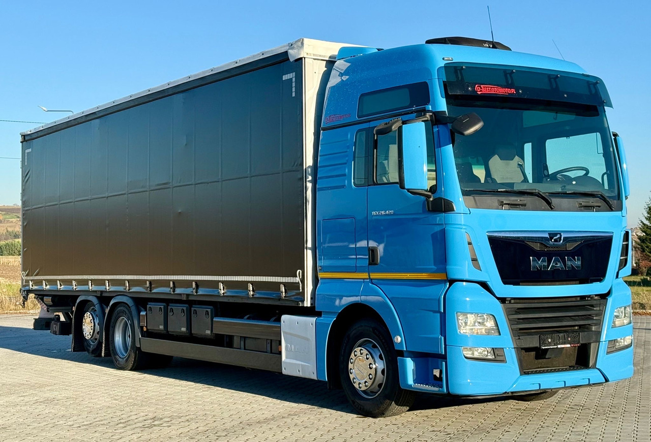 MAN TGX 26.420 / FIRANKA / WINDA / 23 EUROPALETY / 6x2 / AUTOMAT / EURO 6 / OŚ PODNOSZONA / DUŻA KABINA / 2019 ROK - Schuifzeilen vrachtwagen: afbeelding 1 MAN TGX 26.420 / FIRANKA / WINDA / 23 EUROPALETY / 6x2 / AUTOMAT / EURO 6 / OŚ PODNOSZONA / DUŻA KABINA / 2019 ROK - Schuifzeilen vrachtwagen: afbeelding 1