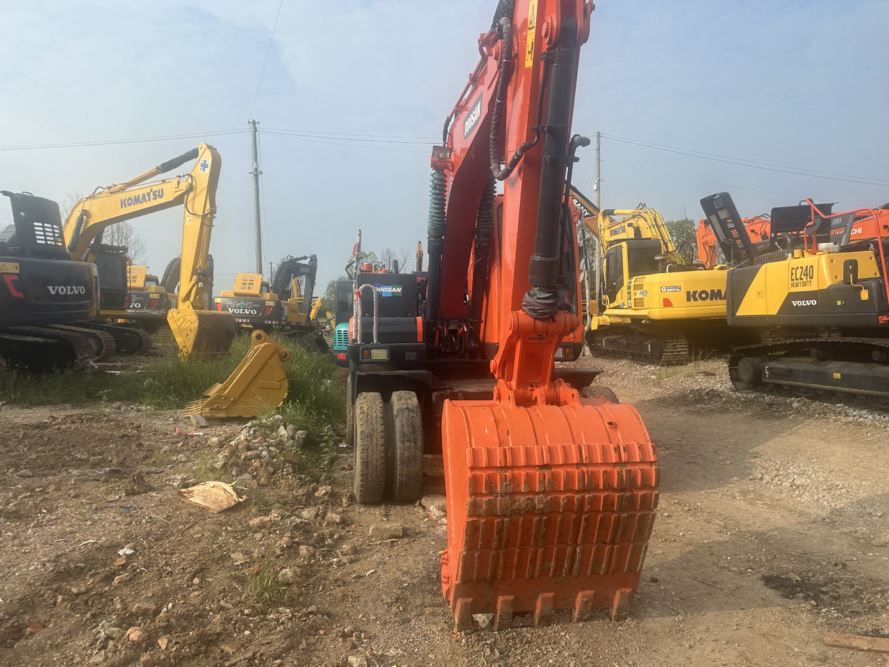 Doosan DX150W-9C - Mobiele graafmachine: afbeelding 3 Doosan DX150W-9C - Mobiele graafmachine: afbeelding 3