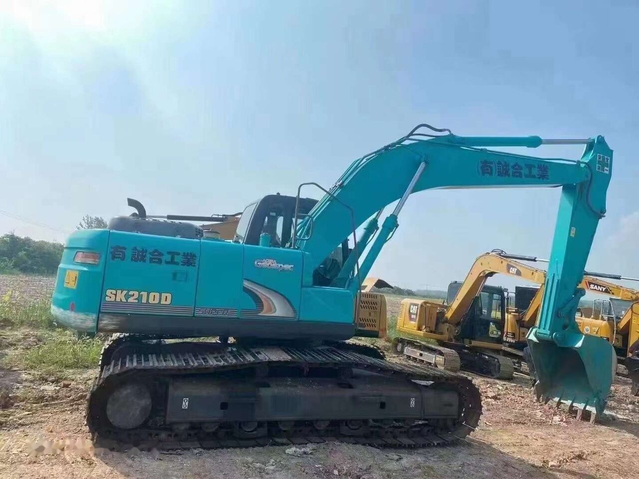 Kobelco SK210D - Rupsgraafmachine: afbeelding 3 Kobelco SK210D - Rupsgraafmachine: afbeelding 3
