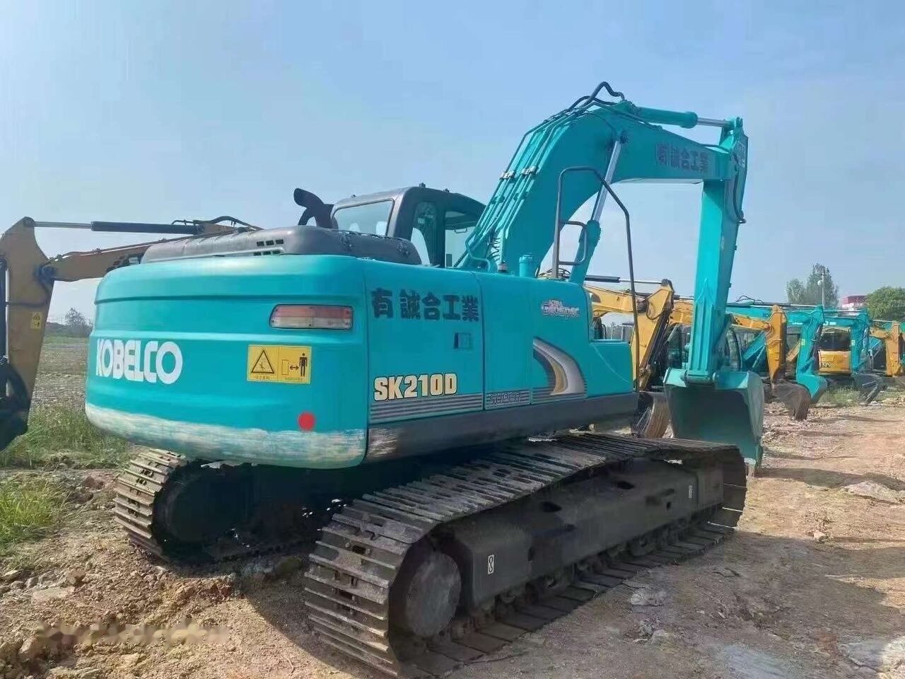 Kobelco SK210D - Rupsgraafmachine: afbeelding 2 Kobelco SK210D - Rupsgraafmachine: afbeelding 2