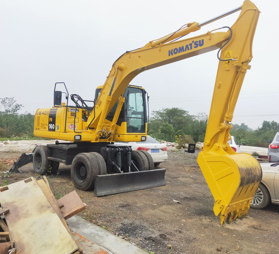 Komatsu PW160 - Rupsgraafmachine: afbeelding 1 Komatsu PW160 - Rupsgraafmachine: afbeelding 1