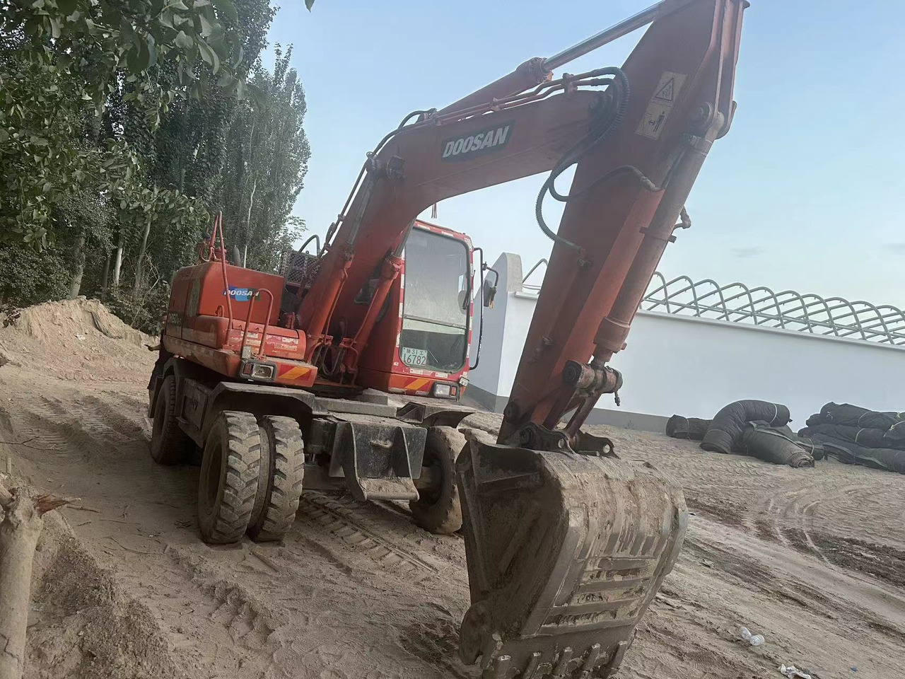 DOOSAN DH150W-7 - Mobiele graafmachine: afbeelding 4 DOOSAN DH150W-7 - Mobiele graafmachine: afbeelding 4