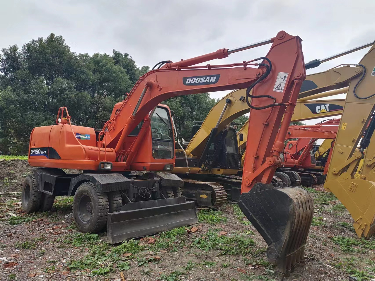 DOOSAN DH150W-7 - Mobiele graafmachine: afbeelding 1 DOOSAN DH150W-7 - Mobiele graafmachine: afbeelding 1