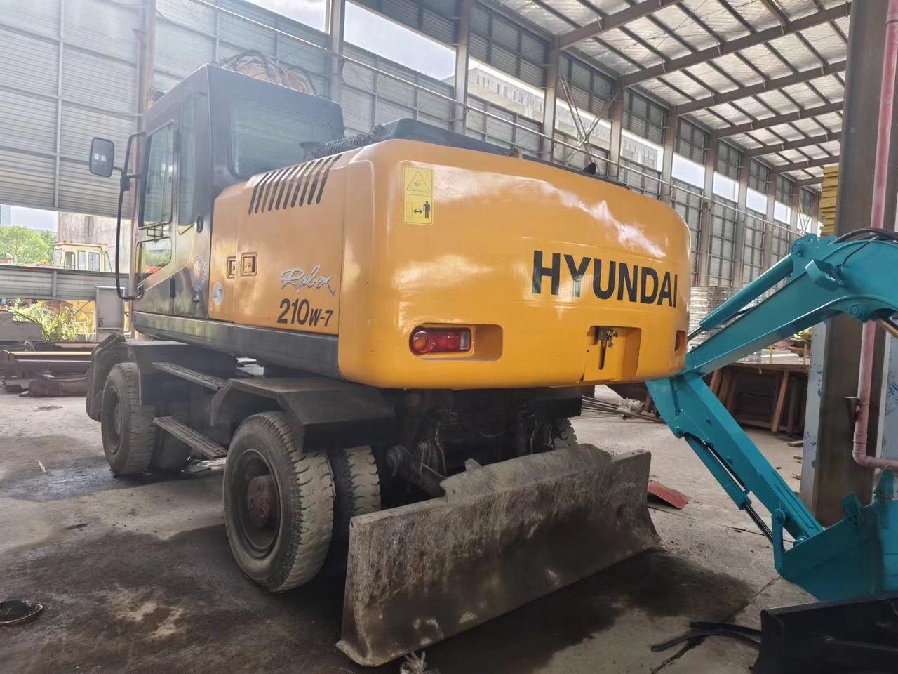HYUNDAI 210W-7 - Mobiele graafmachine: afbeelding 4 HYUNDAI 210W-7 - Mobiele graafmachine: afbeelding 4