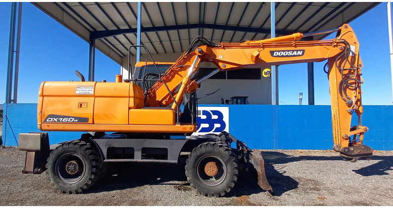 Doosan DX140W-3 *coming soon* - Mobiele graafmachine: afbeelding 2 Doosan DX140W-3 *coming soon* - Mobiele graafmachine: afbeelding 2