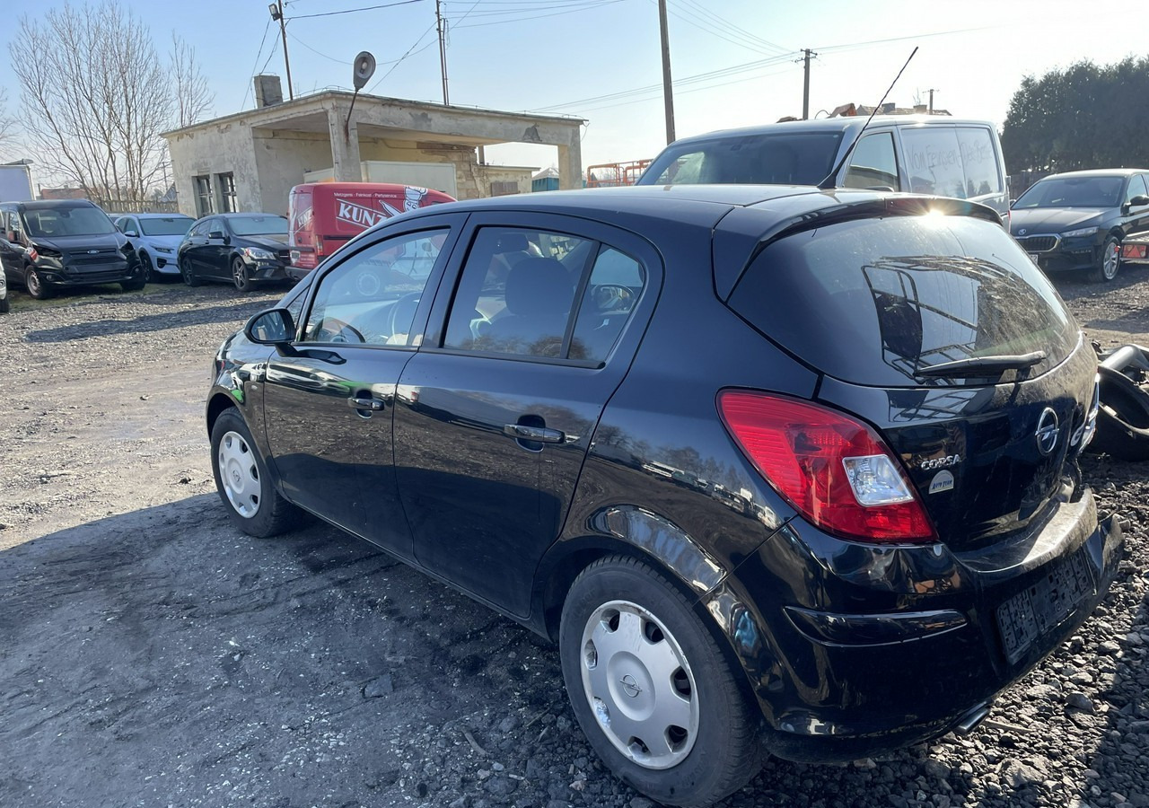 Opel Corsa D Corsa 1.4-87 KM Klima 2011 - Hatchback: afbeelding 5 Opel Corsa D Corsa 1.4-87 KM Klima 2011 - Hatchback: afbeelding 5