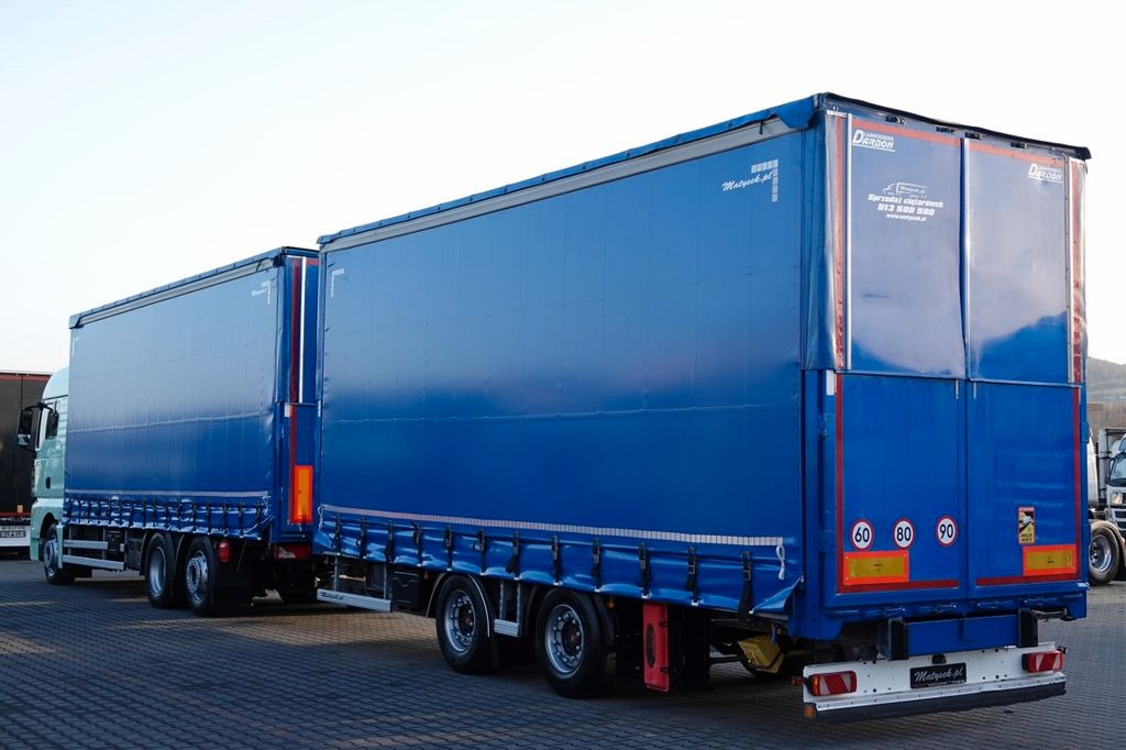 MAN TGX 26.460 / ZESTAW TANDEM PRZEJAZDOWY / 120 M3 - Schuifzeilen vrachtwagen: afbeelding 2 MAN TGX 26.460 / ZESTAW TANDEM PRZEJAZDOWY / 120 M3 - Schuifzeilen vrachtwagen: afbeelding 2