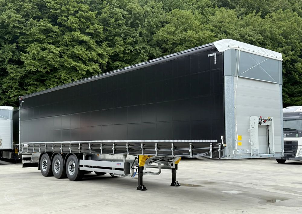 Schmitz Cargobull STANDARD + DACH VARIOS SIMPLE - Schuifzeiloplegger: afbeelding 4 Schmitz Cargobull STANDARD + DACH VARIOS SIMPLE - Schuifzeiloplegger: afbeelding 4