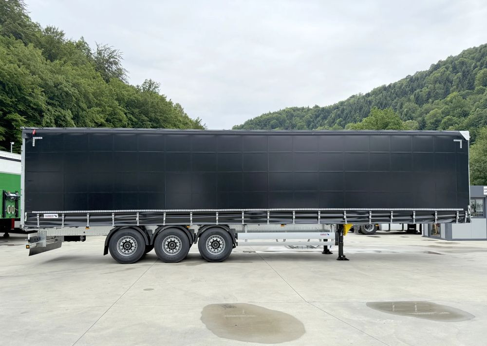 Schmitz Cargobull STANDARD + DACH VARIOS SIMPLE - Schuifzeiloplegger: afbeelding 2 Schmitz Cargobull STANDARD + DACH VARIOS SIMPLE - Schuifzeiloplegger: afbeelding 2