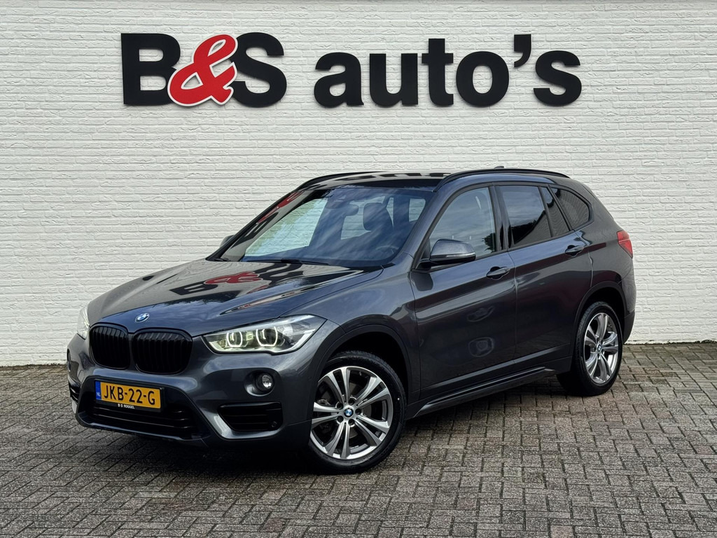 BMW X1-SDrive18i High Executive Automaat Cruise control Climate control Stoelverwarming Navigatie Full LED Head-up display Camera - SUV: afbeelding 1 BMW X1-SDrive18i High Executive Automaat Cruise control Climate control Stoelverwarming Navigatie Full LED Head-up display Camera - SUV: afbeelding 1