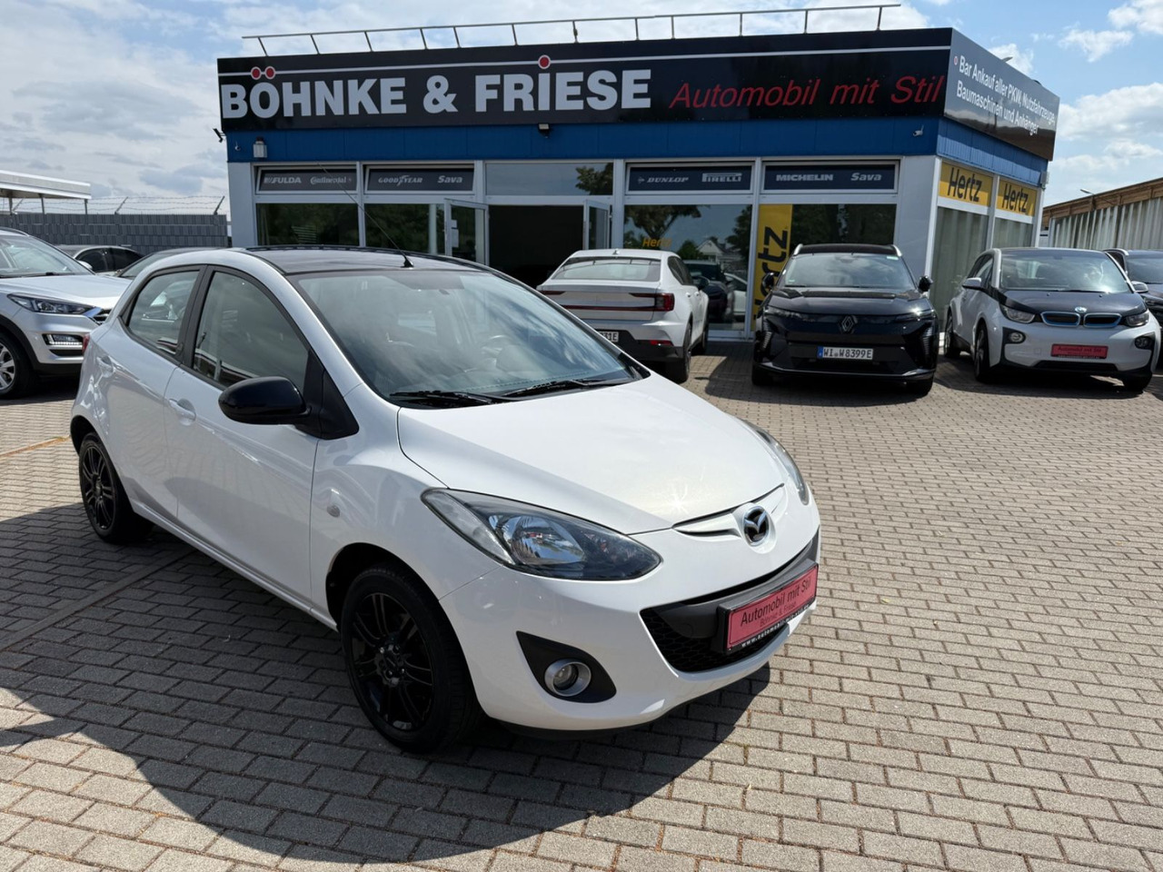 Mazda 2 Lim. 1.3 Origami 5 TÜER KLIMA SHZ TÜV NEU - Personenwagen: afbeelding 1 Mazda 2 Lim. 1.3 Origami 5 TÜER KLIMA SHZ TÜV NEU - Personenwagen: afbeelding 1