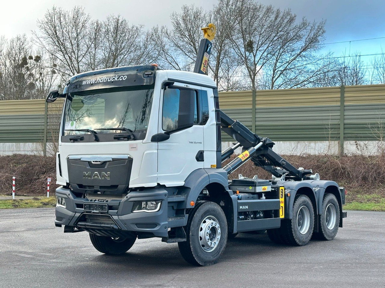 MAN TGS 33.440 6x4 Euro6e Abrollkipper Hyva - Haakarmsysteem vrachtwagen, Kraanwagen: afbeelding 1 MAN TGS 33.440 6x4 Euro6e Abrollkipper Hyva - Haakarmsysteem vrachtwagen, Kraanwagen: afbeelding 1