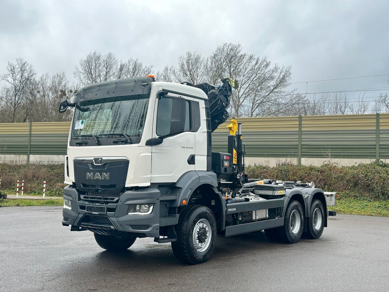 MAN TGS 33.440 6x6 BB Abrollkipper+Kran Hiab 228-6 - Haakarmsysteem vrachtwagen, Kraanwagen: afbeelding 2 MAN TGS 33.440 6x6 BB Abrollkipper+Kran Hiab 228-6 - Haakarmsysteem vrachtwagen, Kraanwagen: afbeelding 2