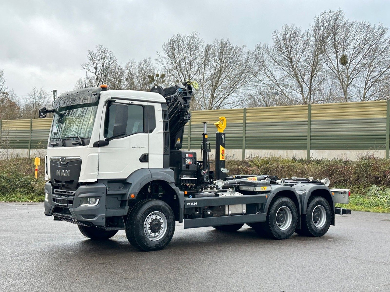 MAN TGS 33.440 6x6 BB Abrollkipper+Kran Hiab 228-6 - Haakarmsysteem vrachtwagen, Kraanwagen: afbeelding 3 MAN TGS 33.440 6x6 BB Abrollkipper+Kran Hiab 228-6 - Haakarmsysteem vrachtwagen, Kraanwagen: afbeelding 3