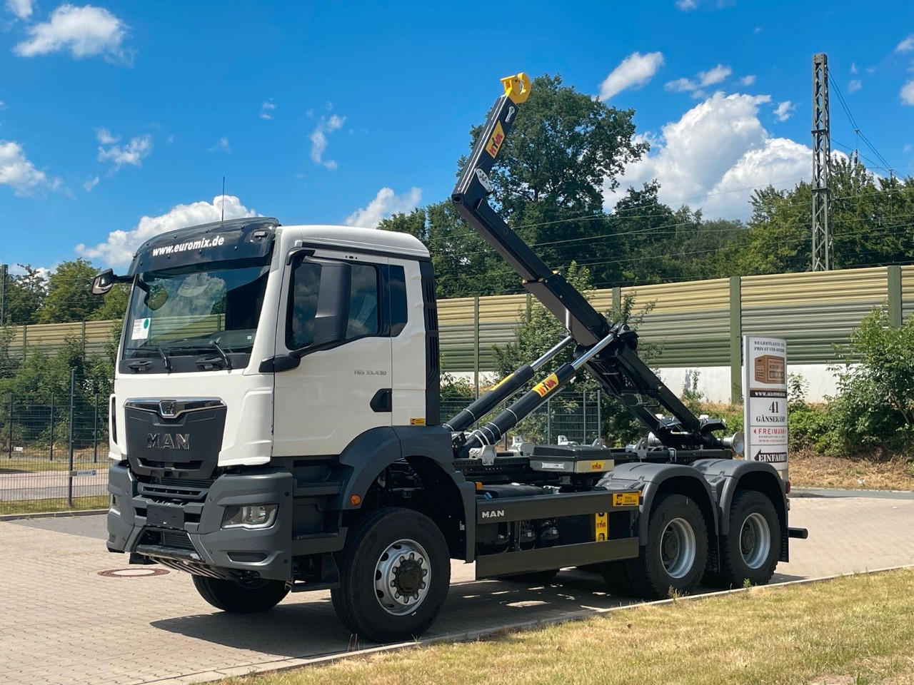 MAN TGS 33.440 6x6 Euro6e Hyva - Hiab MultiLift - Haakarmsysteem vrachtwagen, Kraanwagen: afbeelding 1 MAN TGS 33.440 6x6 Euro6e Hyva - Hiab MultiLift - Haakarmsysteem vrachtwagen, Kraanwagen: afbeelding 1